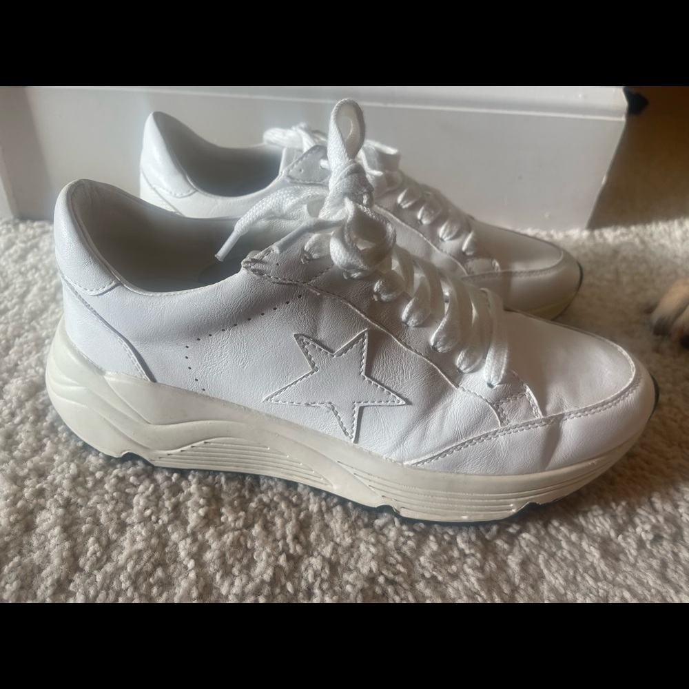Adorable white star tennis shoes.